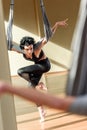 Woman practicing acrobatic aerial dance Royalty Free Stock Photo