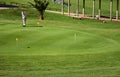 Woman practicing golf