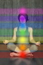 Woman practicing meditation with the chakras. Beautiful young doing yoga in lotus posture the activation of the on