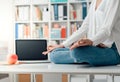 Woman practicing meditation on a desk Royalty Free Stock Photo