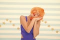 Woman practicing sleepy emotional expression. Lady actress practicing performance. Girl posing striped background of