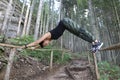 Woman practicing yoga on bridge Royalty Free Stock Photo