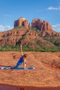 Woman Practicing Yoga at Cathedral Rocks Sedona Arizona