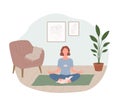 Stay home concept. Woman practicing yoga and enjoying meditation at home. Cozy interior, room, apartment Royalty Free Stock Photo