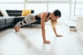 Woman Practicing Yoga At Home Doing Sun Salutation Routine Royalty Free Stock Photo