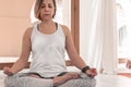 Woman practicing Yoga. How to Keep Your Arms for a Kriya or Meditation