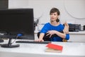 woman practicing yoga in the office Royalty Free Stock Photo