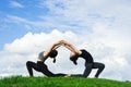 Woman practicing yoga relax in nature and blue sky background Royalty Free Stock Photo