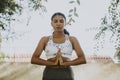 Woman practicing yoga for relaxation Royalty Free Stock Photo