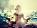 Woman Practicing Yoga by the Sea Royalty Free Stock Photo