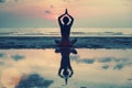 Woman practicing yoga during sunset at the seaside. Royalty Free Stock Photo