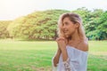 Woman pray in the garden, Beautiful woman with white dress believe in God, christian study concept Royalty Free Stock Photo