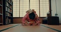 Woman, prayer and Japanese or spiritual religion in tatami room for tradition culture, respect or ritual. Asian person