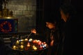 Woman praying in Catholic church in Paris, France Royalty Free Stock Photo