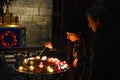 Woman praying in Catholic church in Paris, France Royalty Free Stock Photo