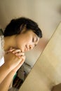 Woman praying in church Royalty Free Stock Photo