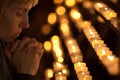 Woman praying in church