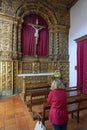 Woman praying in church Royalty Free Stock Photo