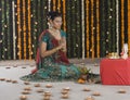 Woman praying on Diwali