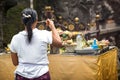 Woman praying god in Ubud, Bali, Indonesia