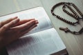 Woman praying with her bible Royalty Free Stock Photo