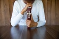 Woman praying while holding Bible and cross, Pray in the Morning , Woman praying with hands together on the Sunrise background Royalty Free Stock Photo