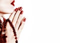 Woman praying with rosary Royalty Free Stock Photo