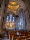 Woman praying in the Sacred Heart of Jesus basilica Royalty Free Stock Photo