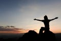 Woman praying at sunset mountains, concept vacations outdoor harmony with nature landscape, Travel Lifestyle spiritual relaxation Royalty Free Stock Photo