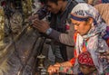 Woman praying at the Swayambhunath temple in Kathmandu Royalty Free Stock Photo