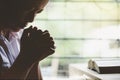 Woman praying to God at home in the morning Royalty Free Stock Photo