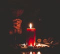 Woman Praying and worship to GOD Using hands to pray in religious beliefs and worship christian with Red Candle with fire against Royalty Free Stock Photo