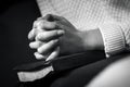 Woman prays with folded hands on the bible Royalty Free Stock Photo