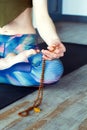 Woman prays with a rosary