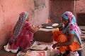 Woman prepare Chapathi bread in kitchen in a village, Uttar Pradesh, India Royalty Free Stock Photo