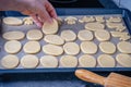 Woman prepares butter cookies at home in the kitchen Royalty Free Stock Photo