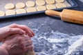 Woman prepares butter cookies at home in the kitchen Royalty Free Stock Photo