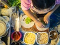 Woman prepares Popiah street food.