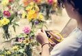 Woman preparing and arranging flowers Royalty Free Stock Photo