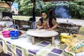 The woman is preparing the Azerbaijani bread