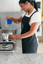 Woman preparing coffee in the kitchen. Conceptual image Royalty Free Stock Photo