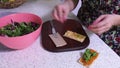 Woman is preparing dietetic breakfast