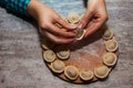 Woman preparing dumplings hands