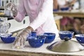 Woman preparing food at an outdoor restaurant Royalty Free Stock Photo