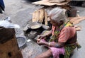 Woman preparing food on street, Kolkata Royalty Free Stock Photo