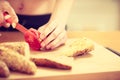 Woman preparing healthy breakfast making sandwich Royalty Free Stock Photo