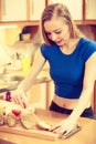 Woman preparing healthy breakfast making sandwich Royalty Free Stock Photo