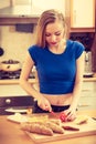 Woman preparing healthy breakfast making sandwich Royalty Free Stock Photo