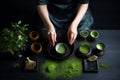 Woman preparing matcha tea at black table ceremony. Generate Ai Royalty Free Stock Photo