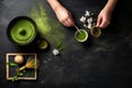 Woman preparing matcha tea at black table nature. Generate Ai